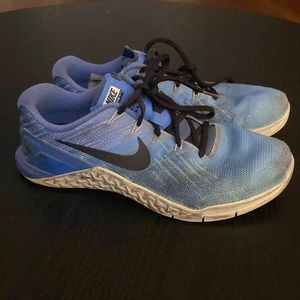 Metcon 3 women’s size 9.5. Worn but still have some good workouts in them